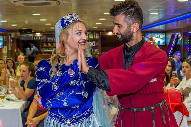 Bosphorus Sightseeing Cruise With Turkish Live Show and Dinner - Dinner and Entertainer Highlights