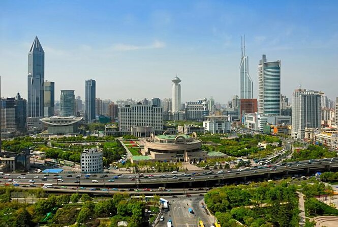 China Acrobatics Show and Shanghai Evening Tour - Tour Overview