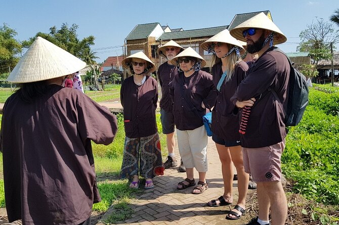 Cooking Class in Tra Que Village With Market and Garden Tour - Sampling the Menu