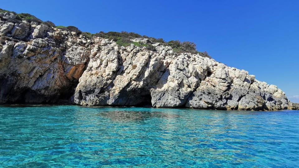 From SantAntioco: Beaches and Coves Mini Dinghy Cruise - Key Points