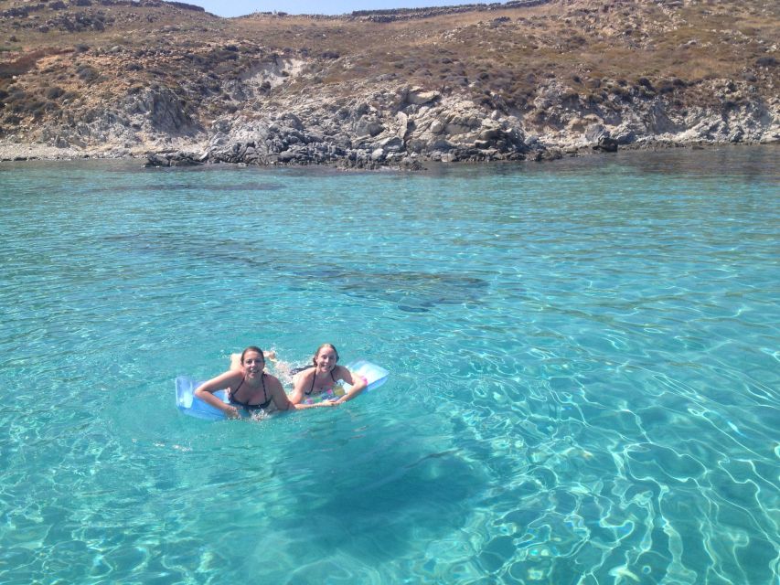 Mykonos: South Beaches & Rhenia Yacht Cruise With Transfers - Key Points