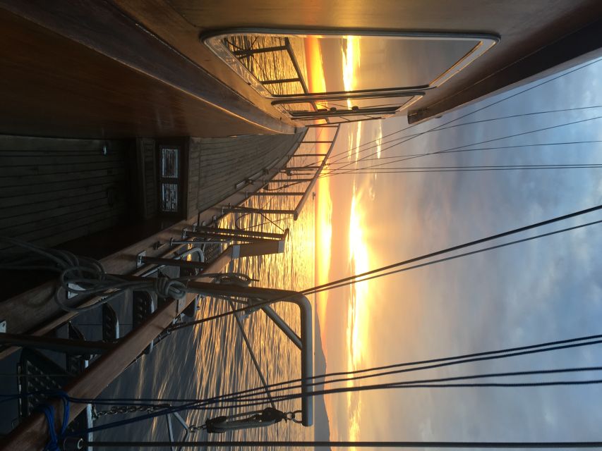 Mykonos: Sunset Boat Cruise With Light Dinner & Drinks - Key Points