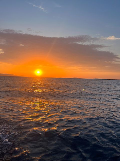 Paros: Sunset Boat Tour to Antiparos With Wine - Key Points