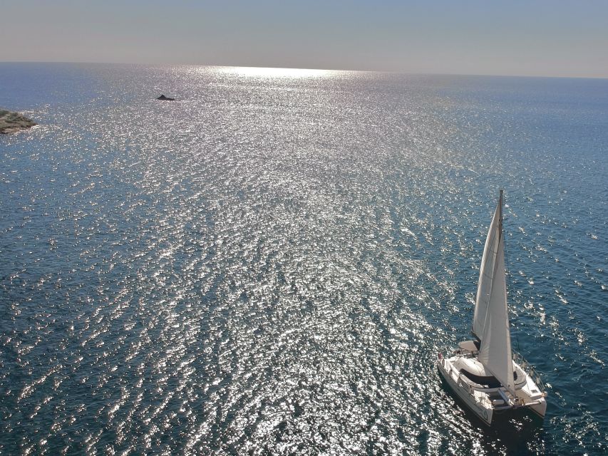 Santorini: Private Catamaran Excursion With Food and Drinks - Key Points