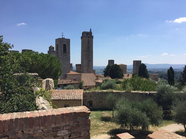 Siena San Gimignano Pisa Escorted Transport and Optional Lunch - Key Points