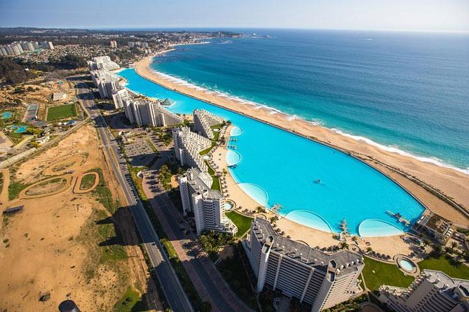 Small Group Full-Day Tour to Isla Negra, San Alfonso Del Mar, and Pomaire - Itinerary Breakdown