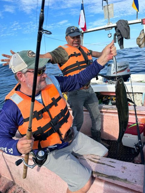 Sport Fishing by Boat & Chilean Empanadas From Santiago