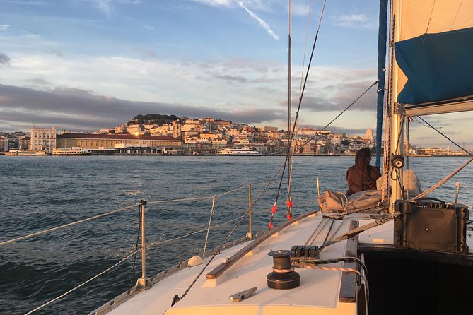 Lisbon Sunset Sensations on a Private Sailing Boat With Wine&Snacks - Stunning Sunset Views