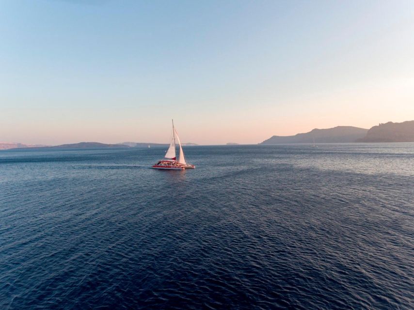 Santorini: Cruise Catamaran With BBQ & Drinks Day or Sunset - Itinerary Highlights