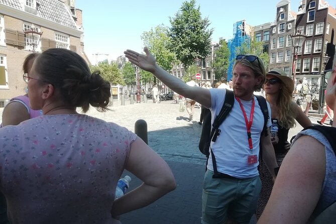 Amsterdam Walking Tour With a Local Comedian as Guide - Booking and Cancellation Policy