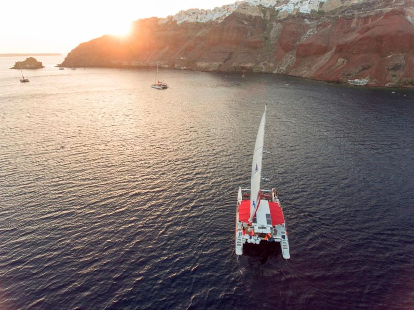 Santorini: Cruise Catamaran With BBQ & Drinks Day or Sunset - Pickup and Dropoff