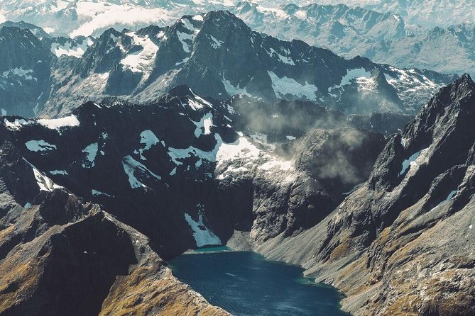 Milford Sound Overhead Flight With Landing From Queenstown - Weather and Safety Considerations