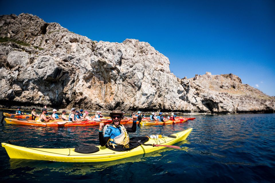 Rhodes: Sea Kayak Adventure to the Red Sand Beach - Booking and Cancellation