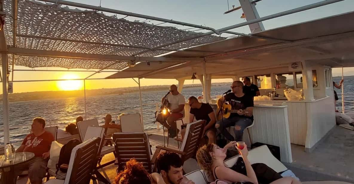 Rhodes: Sunset Cruise With Live Music, Wine & Greek Buffet - Cruise Highlights and Sights