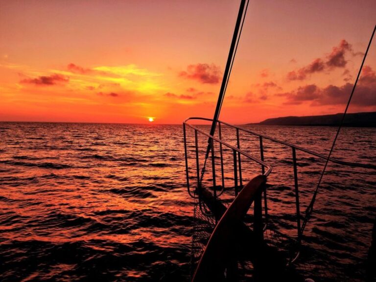 Argostoli: Sunset Cruise With Swim Stops, Dinner, and Wine