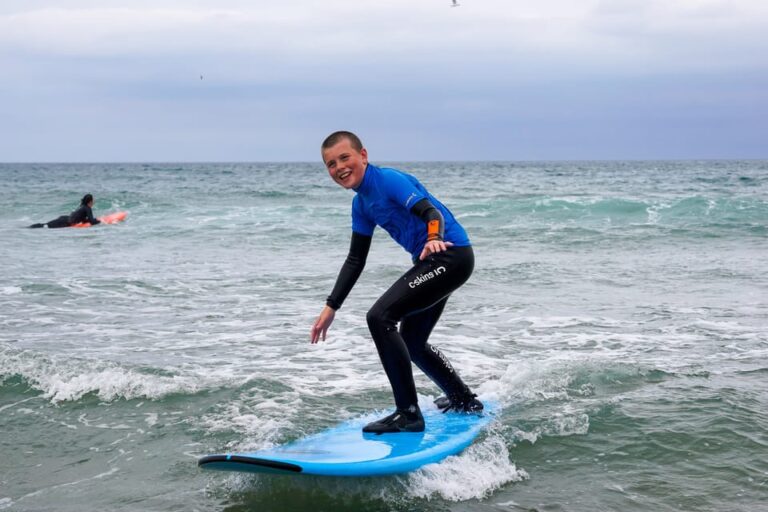 Learn to Surf in the Clear Waters of Beautiful Cullen Bay