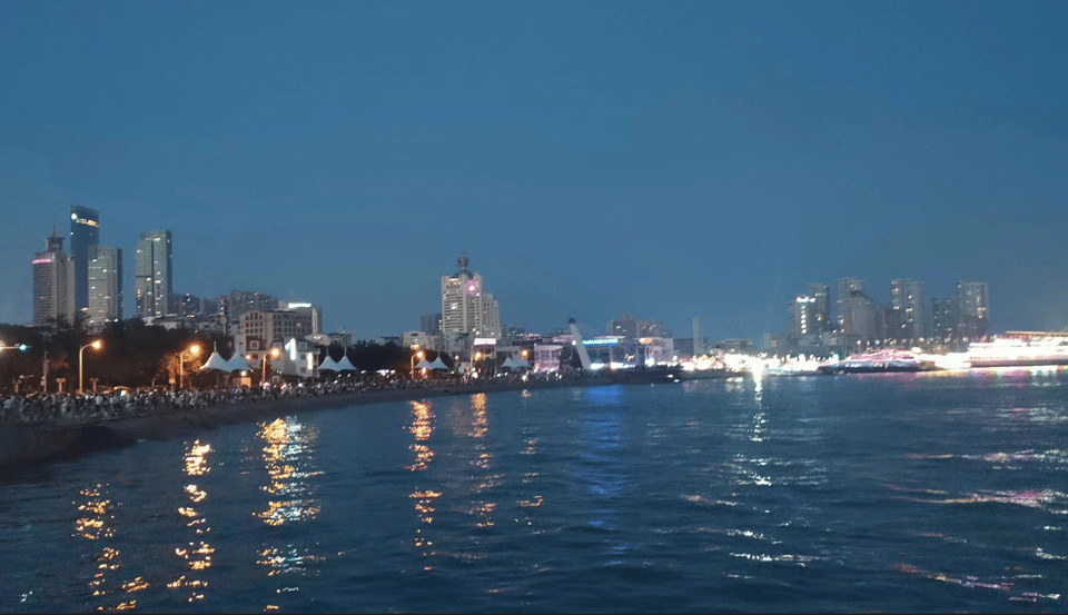 Qingdao Walking Night Tour With Seafood Hot Pot and Beer - Itinerary Highlights