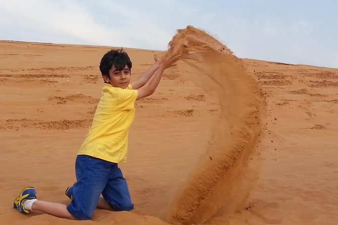 Red Dune Desert Safari & Quad Bike, BBQ Dinner. Camel Ride, Sandboarding