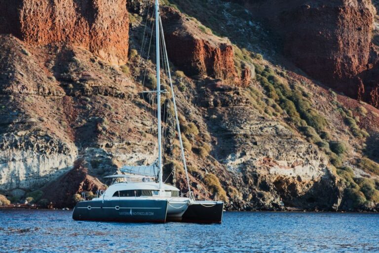 Santorini: Private Catamaran Cruise With BBQ Meal and Drinks