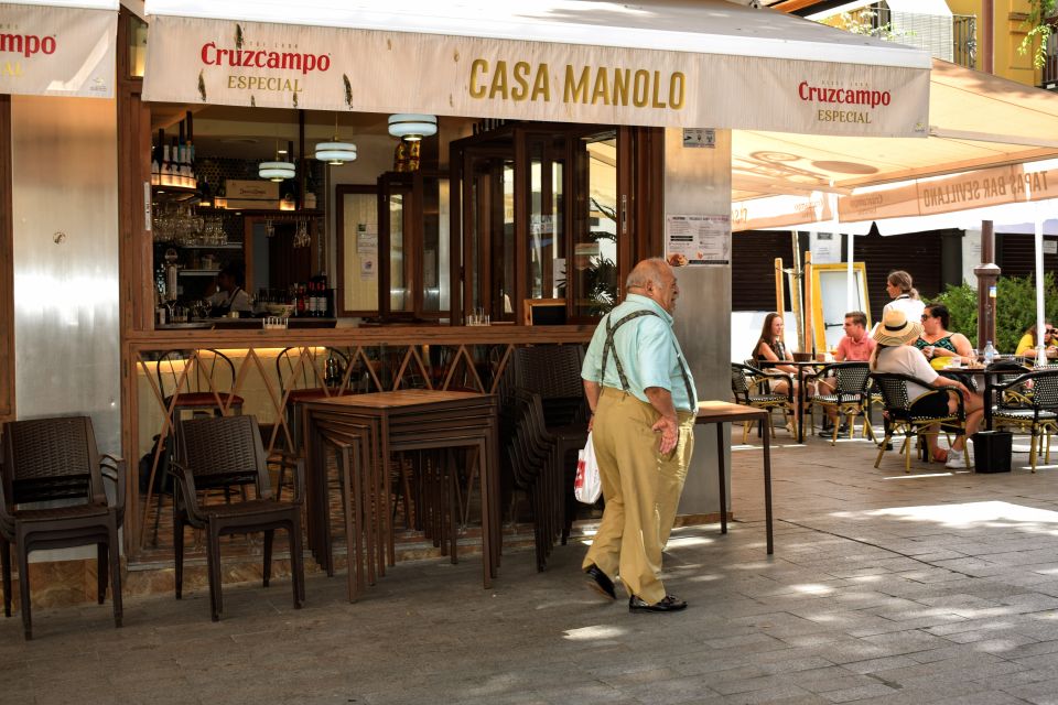 Seville: Tapas, Taverns, and History Walking Tour - Tour Overview and Details