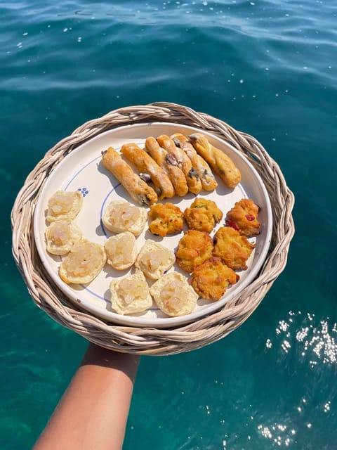 Snorkeling and Tour on Boat to the Caves of Salento