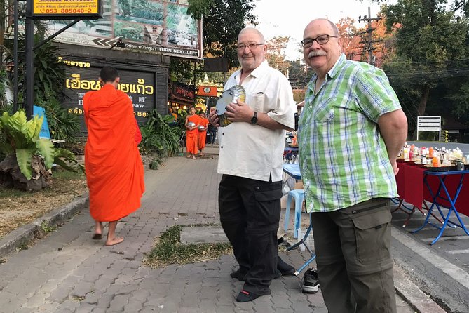 Alms and Wat Phra That Doi Suthep Private Chiang Mai Tour - Warorot Market Highlights