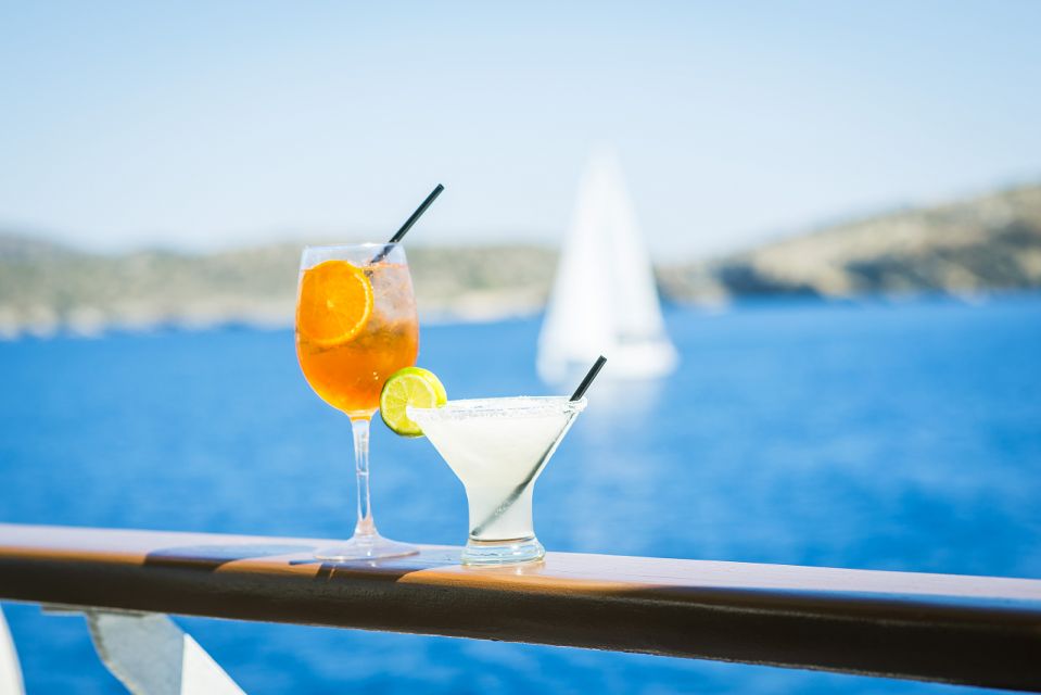 Athens: Swimming Cruise With Lunch, Wine & Live DJ on Board - Itinerary and Experience