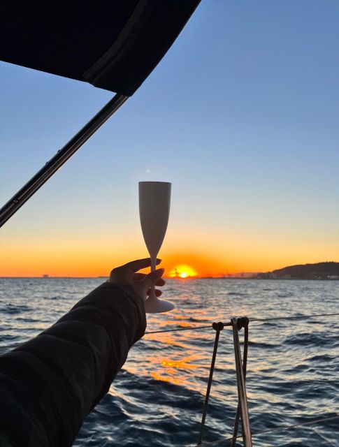 Barcelona: Sunset Sailboat Cruise With Open Bar - Pricing and Reservations