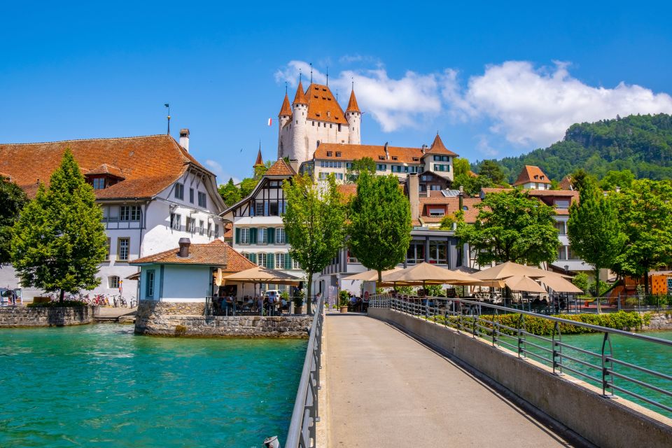 From Interlaken: Beatus Caves, Blue Lake and Lake Thun Tour - Itinerary Highlights