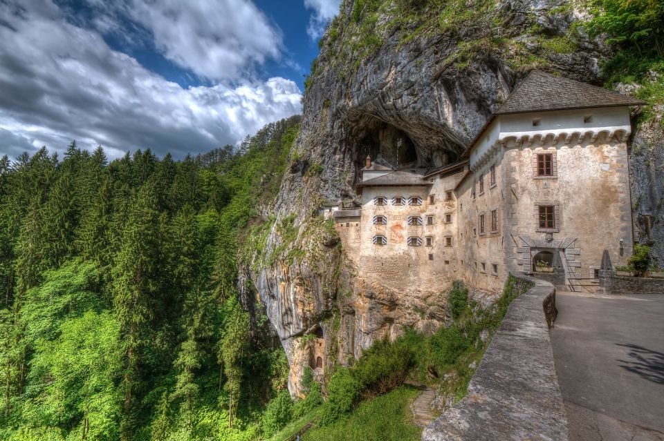 From Kranjska Gora: Postojna Cave & Predjama Castle Day Trip - Highlights of Predjama Castle