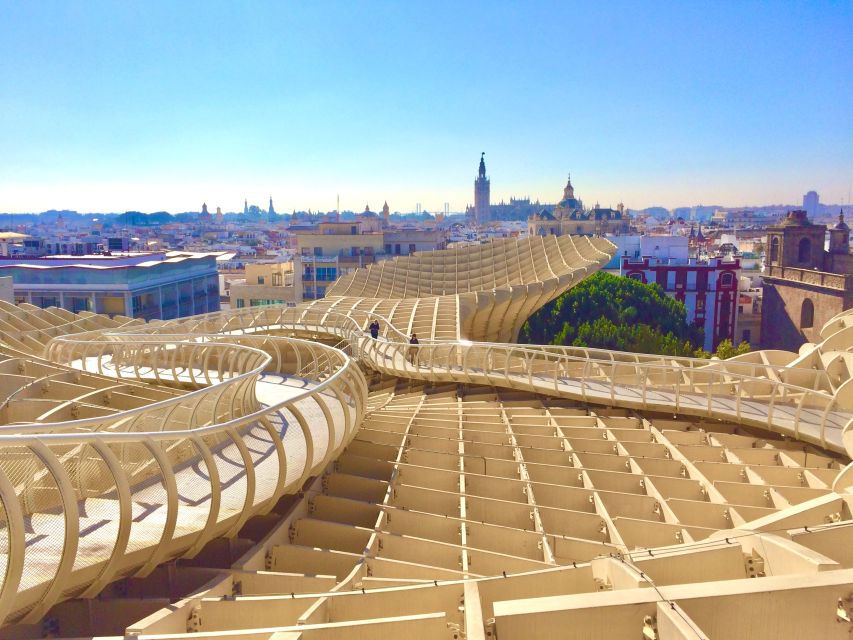 From Malaga: Seville Day Trip Guide Commentary on the Bus - Itinerary and Highlights