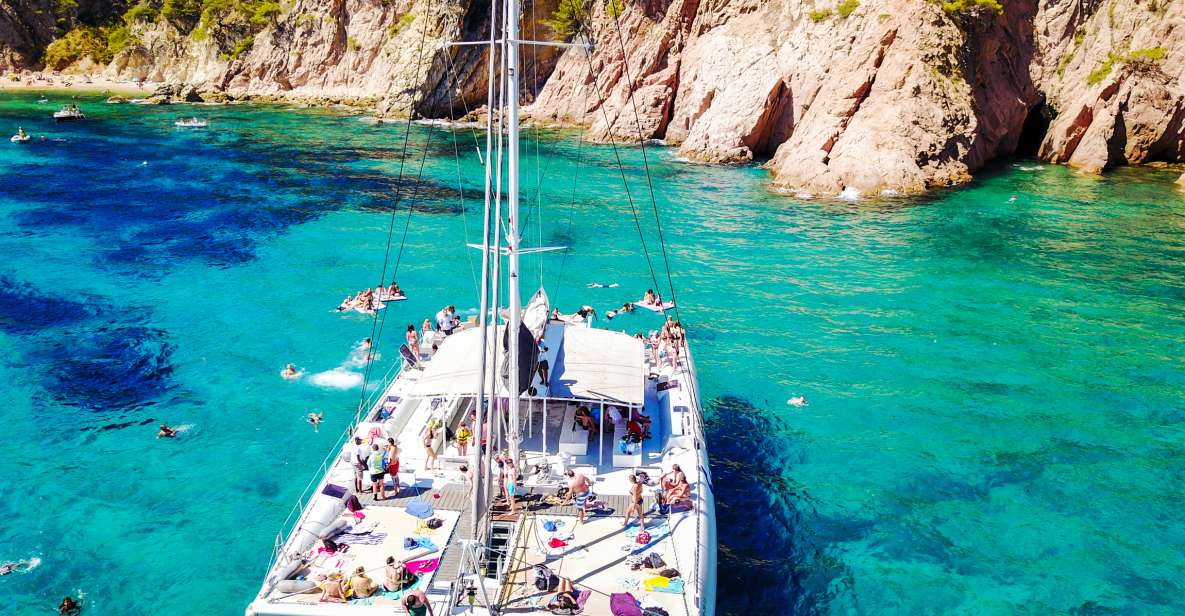 Lloret De Mar: Catamaran Sailing Cruise With BBQ and Drinks - Coastal Landscape and Activities