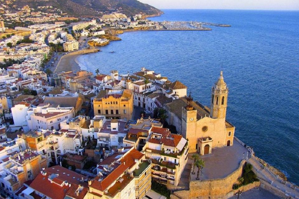 Sitges: Sailboat Trip + Walking Tour and Wine Cellar Tour - Exploring Sitges Historical Highlights