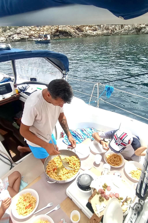 Alghero: Full-Day Sailboat Cruise With Lunch and Snorkeling - Included Amenities and Experiences
