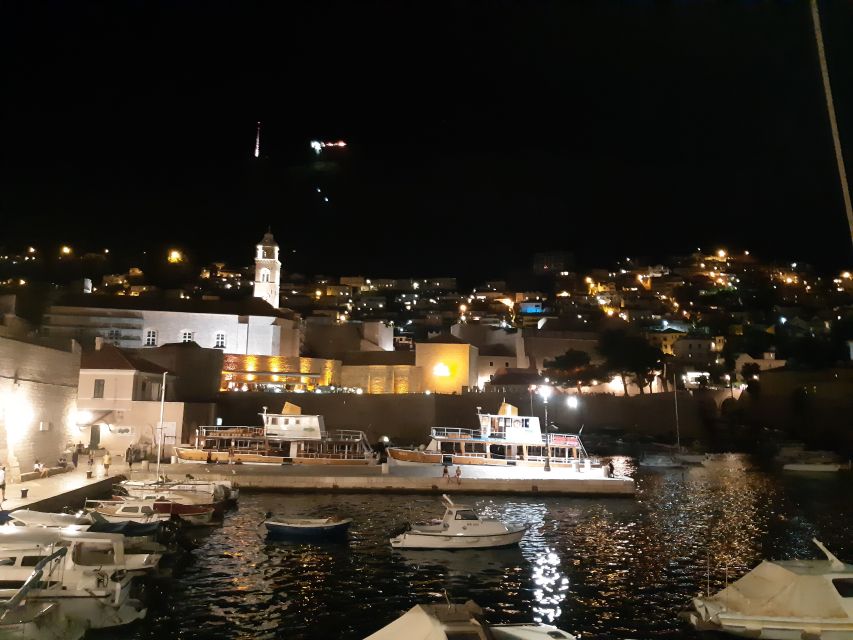 Dubrovnik: Old Town Night Cruise on 16th-Century Karaka Boat - Amenities and Meeting Point