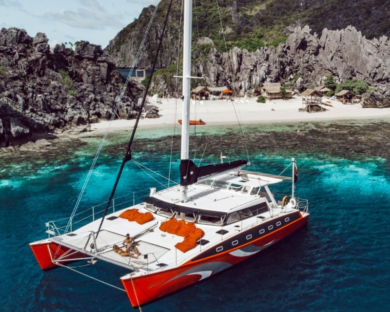 El Nido: Full-Day Premium Island Hopping Catamaran Cruise - Included Amenities and Services