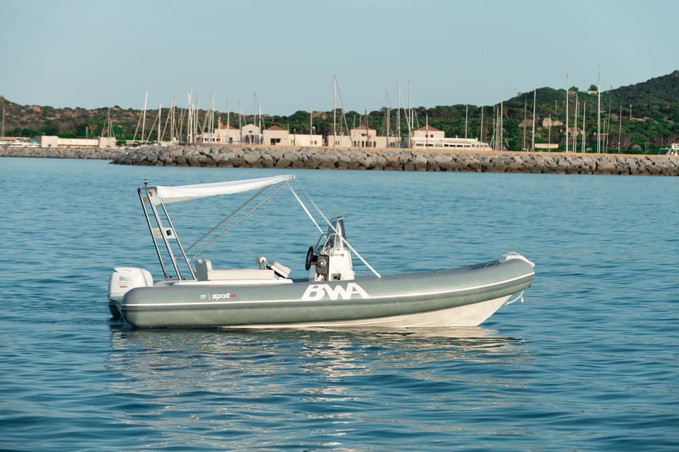 From Notteri: Island of the Cabbages and Punta Molentis Boat Trip - Onboard Experience