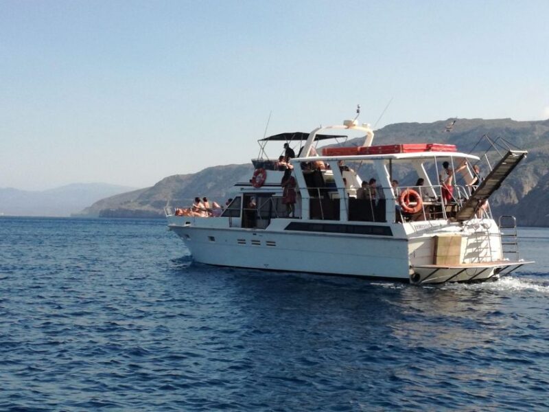 FULL DAY GROUP TOUR KOUTSOMITI KOUNOUPA & RED ROCK WITH MEAL - Boat and Equipment