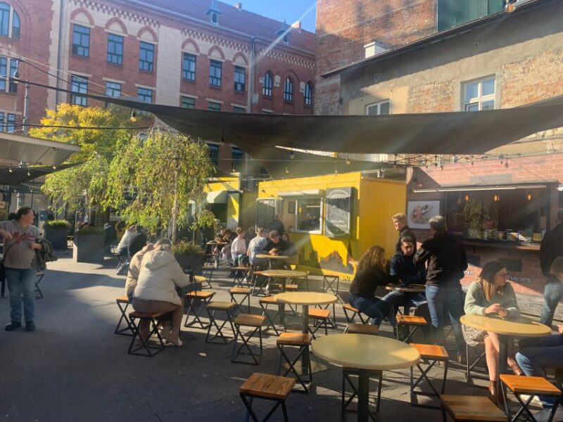 Krakow: Street Food Tour by Electric Car With Tastings - Electric Car Experience