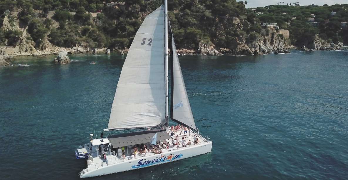 Lloret De Mar: Sunset Catamaran Cruise With DJ and Drinks - Inclusions and Exclusions