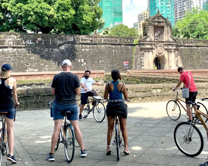 Manila: Guided Sunset Bamboo Bike Tour in Intramuros - Meeting Point and Logistics