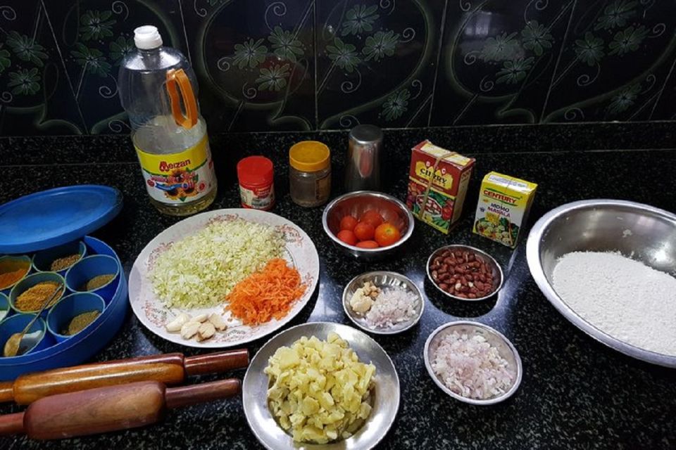 Nepalese Kitchen in Pokhara: Momos or Dal Bhat Cooking Class - Booking Process