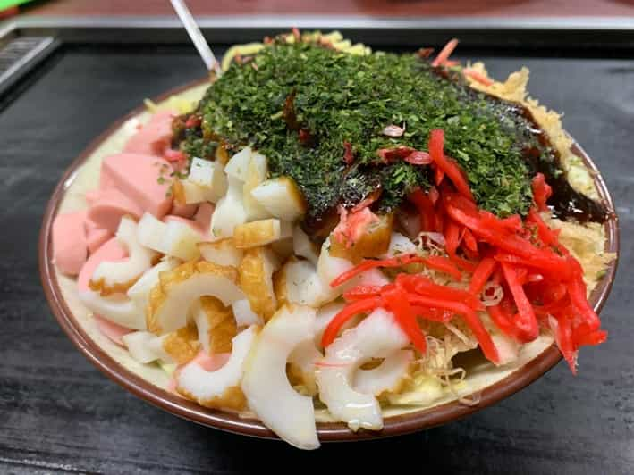 Okonomiyaki Cooking at a Traditional Restaurant. - Learning From Local Guides