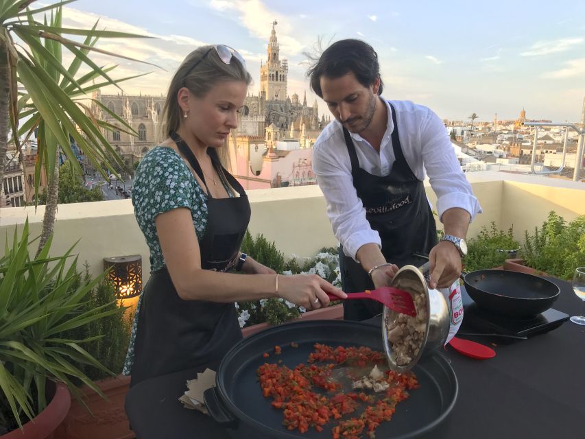 Seville: Highlights Rooftop Tour & Paella Cooking Class - Welcome Drink and Appetizers