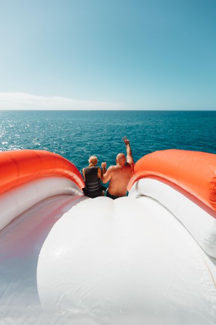 Tenerife: Private Yacht Trip With Water Activities and Slide for 4 Hours - Range of Water Activities