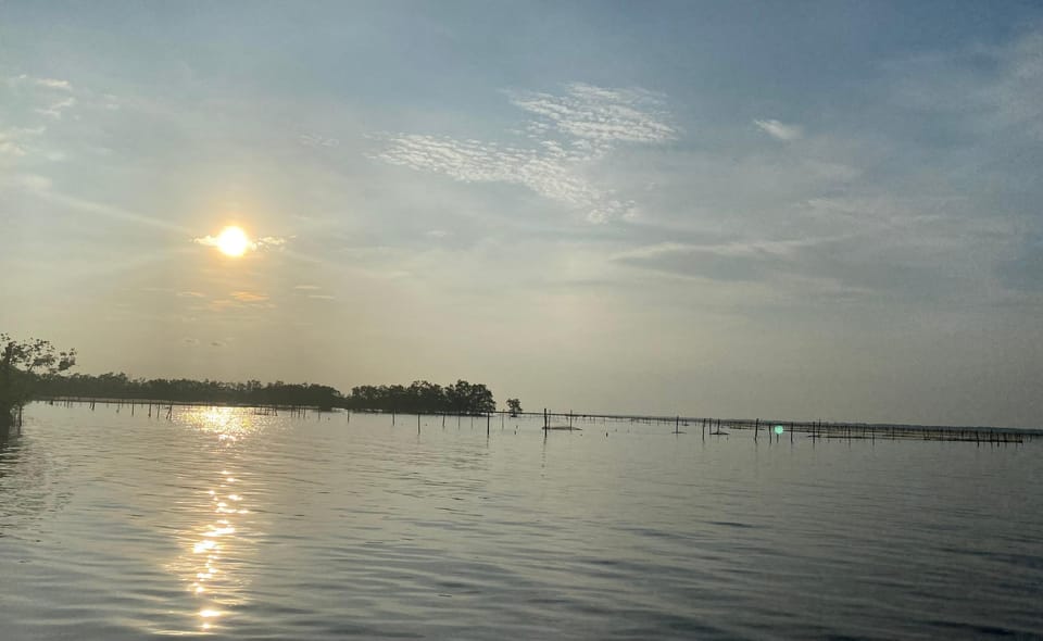 UNVEILING TAM GIANG LAGOONS ENCHANTING SUNSET - Scenic Boat Exploration