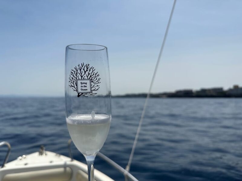 Boat Excursion Between Ognina and Acitrezza With Aperitif - Inclusions and Amenities