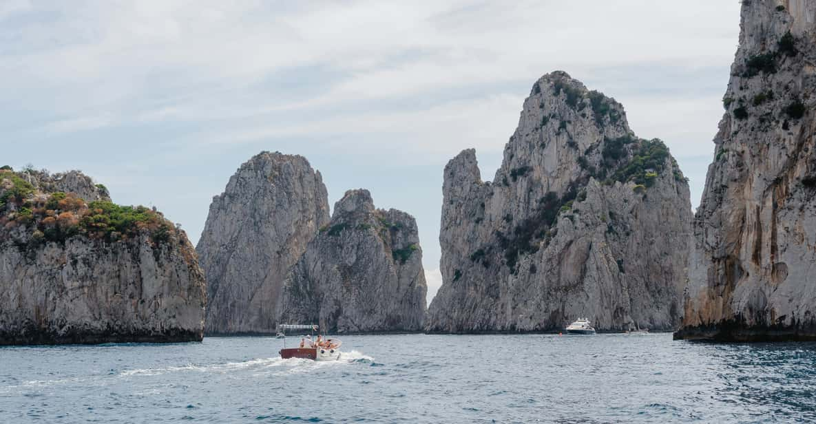 Capri: Private Boat Tour With Faraglioni Rocks and Caves - Experience Description