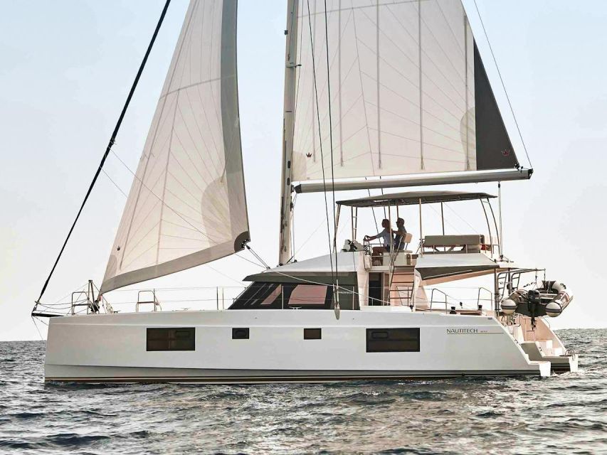 Chania: Private Day Catamaran Cruise With Swimming and Meal - Booking Information and Pricing