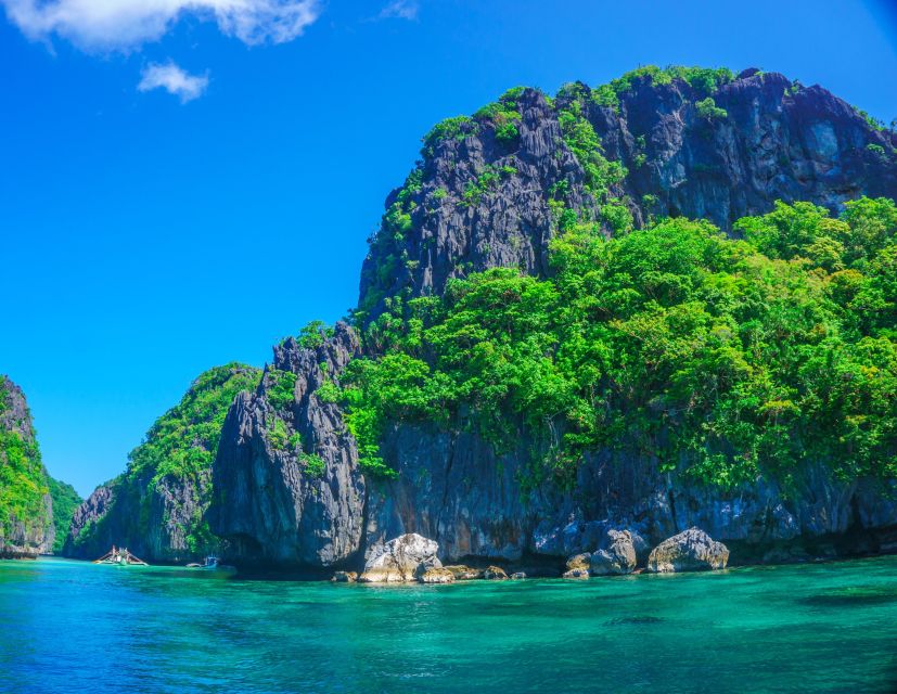 El Nido: Full-Day Premium Island Hopping Catamaran Cruise - Excluded Costs and Limitations